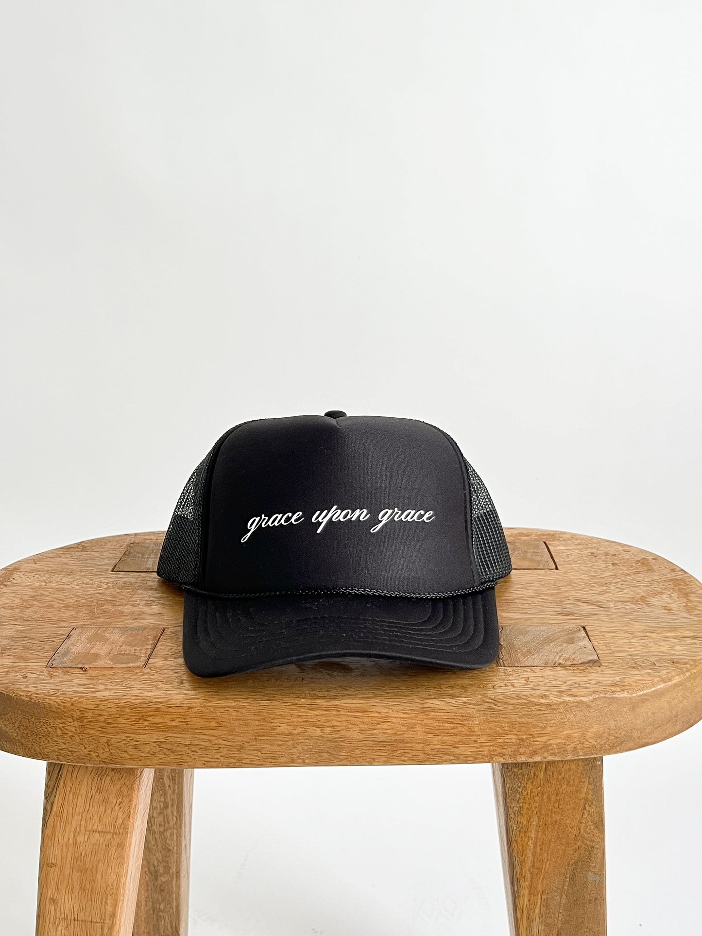 GRACE UPON GRACE TRUCKER HAT // BLACK