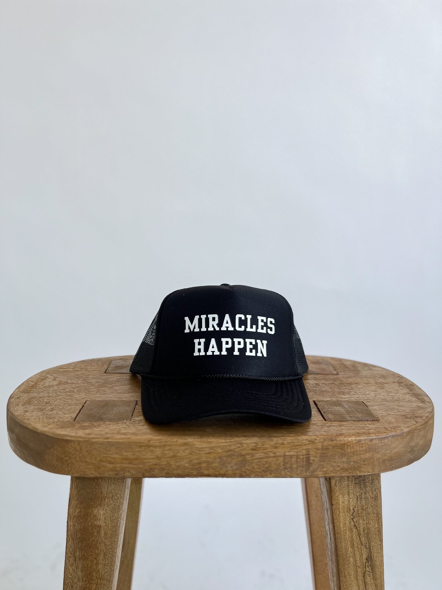 MIRACLES HAPPEN TRUCKER HAT // BLACK