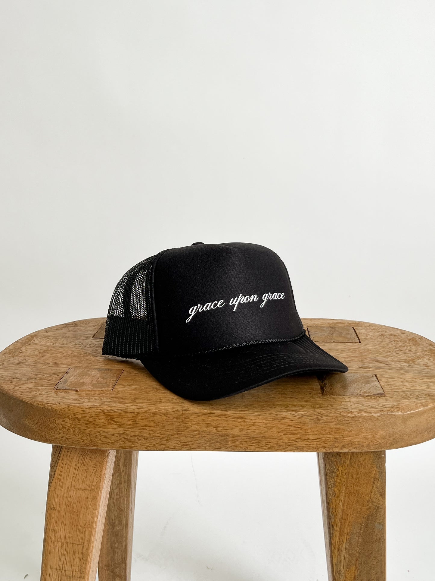 GRACE UPON GRACE TRUCKER HAT // BLACK